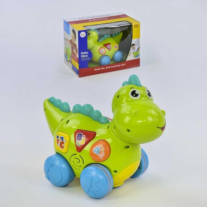 Динозаврик 6105 (18) "Huile Toys", ездит, говорит на английском языке, проигрывает мелодии и звуки, с подсветкой, в коробке